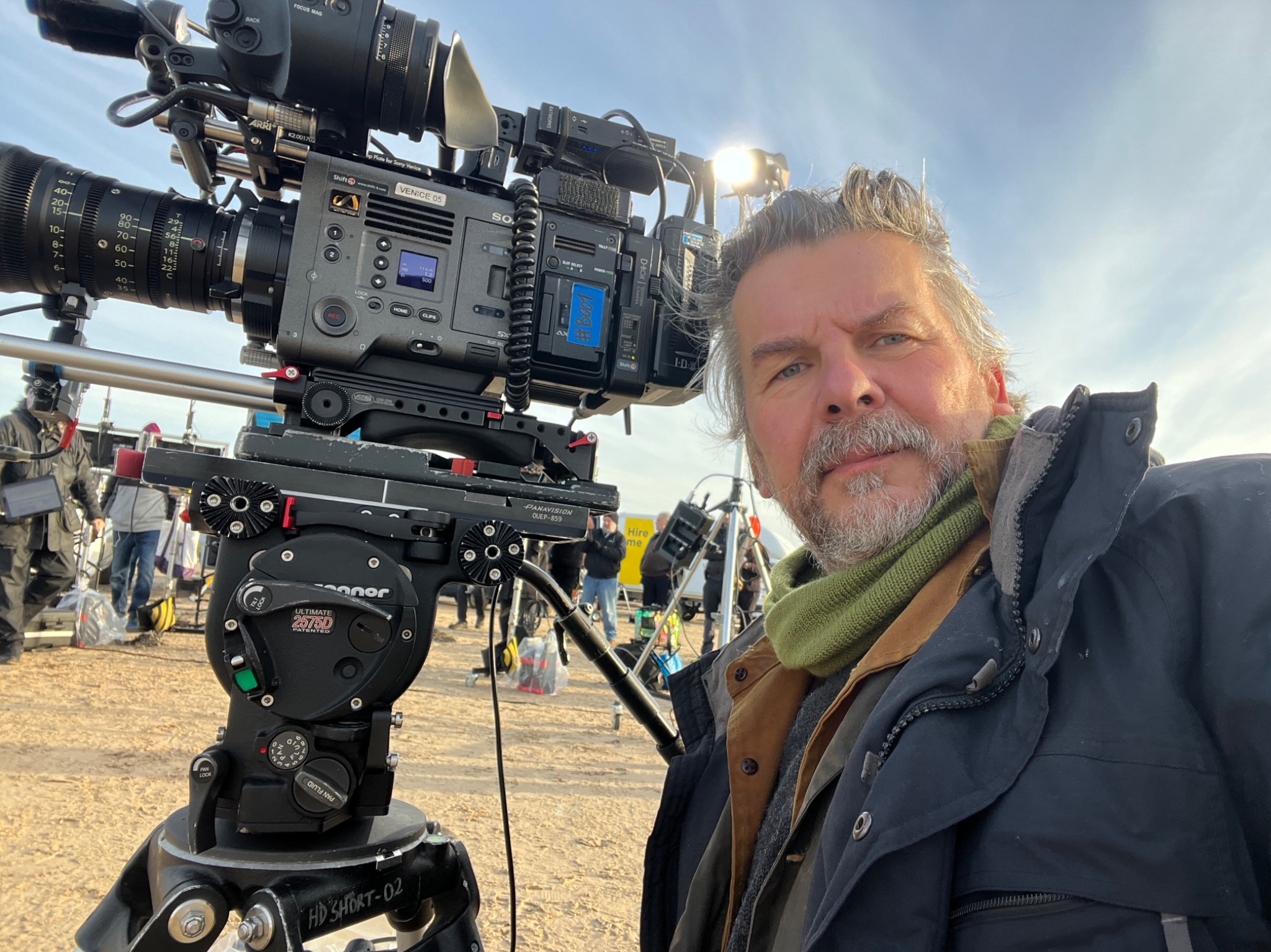 Rick Walker beside a broadcast camera on location
